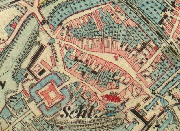 Ein detaillierter alter Stadtplan von Schleswig-Holstein, Deutschland, der Straßen, Gebäude und Sehenswürdigkeiten mit Textbeschriftungen zeigt.