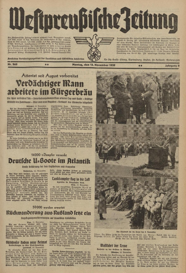 Schwarze Titelseite einer deutschen Zeitung vom 13. November 1939 mit der Überschrift 'Weitpreubliche Zeitung', die eine Gruppe in traditioneller deutscher Tracht in einer feierlichen Umgebung zeigt.
