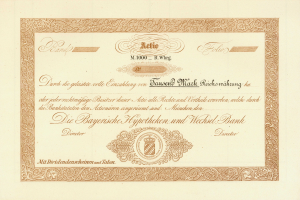 Alte Aktienurkunde mit goldenem Rand, die ein Porträt eines Mannes und Text zeigt.