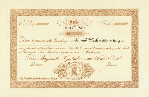 Alte Aktienurkunde mit goldenem Rand, die ein Porträt eines Mannes und Text zeigt.