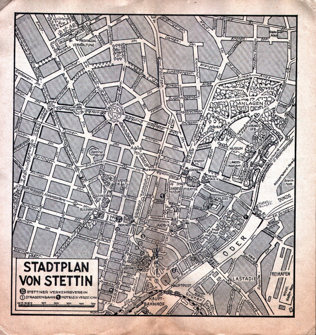 Ein altes, detailliertes Papier-Stadtplan von Stuttgart, der Stra├čen, Geb├Ąude und Landmarken zeigt, mit zus├Ątzlichem Text.