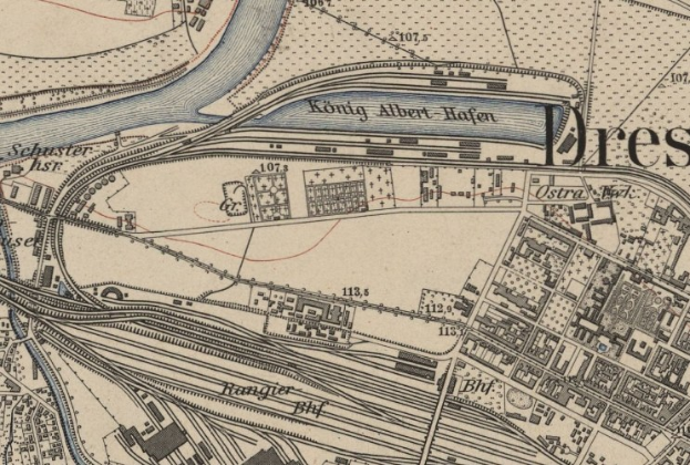 Ein alter Stadtplan von Dresden, Deutschland, der einen Fluss, Gebäude, Straßen und Text zeigt und einen detaillierten Überblick über die Stadt bietet.