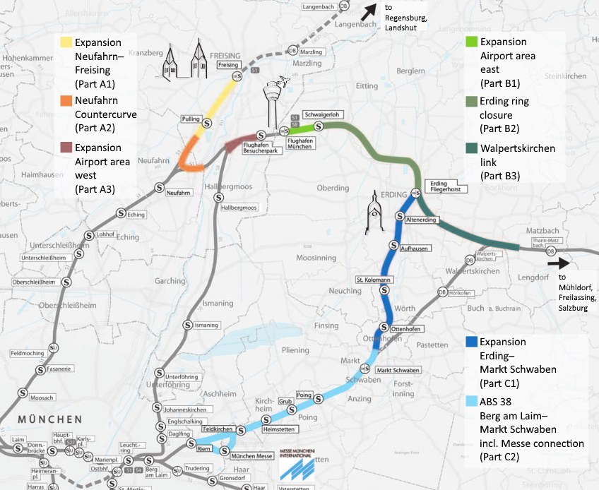 Eine detaillierte Karte einer Stadt mit einer hervorgehobenen Bahnroute von München nach Frankfurt, die Haltestellen und die Umgebung mit zusätzlichen Bahninformationen zeigt.