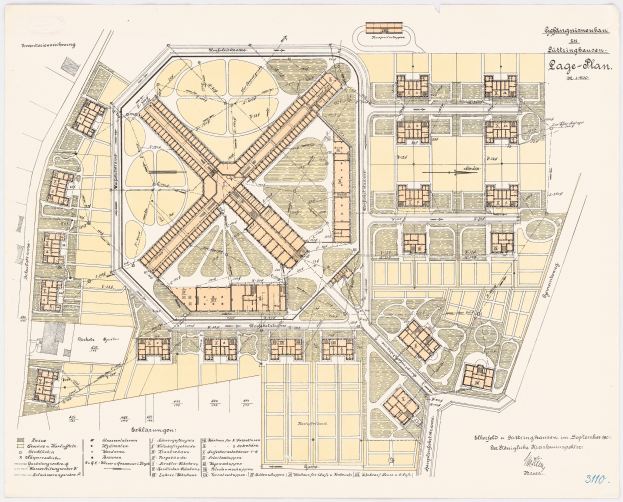 Ein detaillierter Stadtplan von Köln, Deutschland, mit einem Gebäudeplan und begleitendem Text auf dem Papier.
