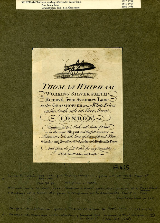 Ein altes Buch mit einer detaillierten Illustration einer Heuschrecke auf dem Cover und sichtbarer handgeschriebener Text auf den Seiten.